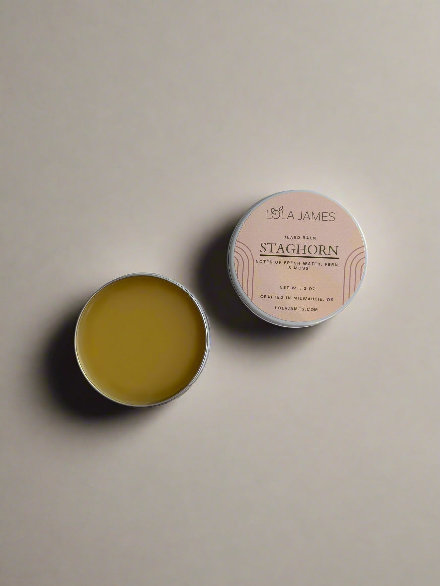 Lola James Staghorn balm in a round container on a white background