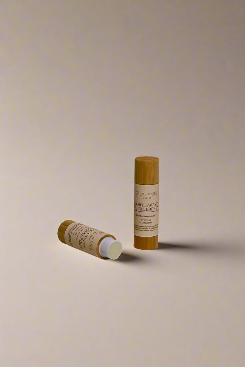2 bamboo lip balms with beige background. 